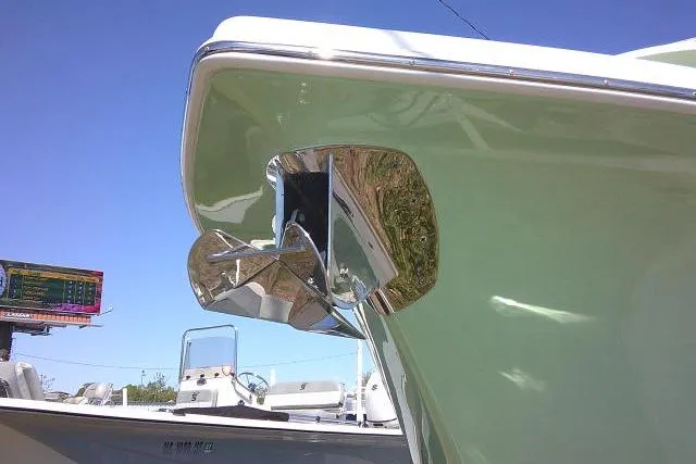 Slide: The Image of 2022 Sea Pro 259 Center Console boat with polished anchor detail against clear blue sky. - 7