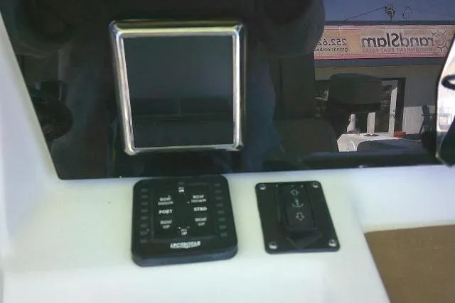 Slide: The Image of Control panel of a 2022 Sea Pro 259 Center Console boat. - 70