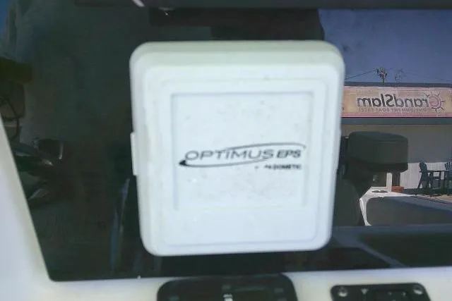 Slide: The Image of Optimus EPS system on 2022 Sea Pro 259 Center Console boat dashboard. - 72