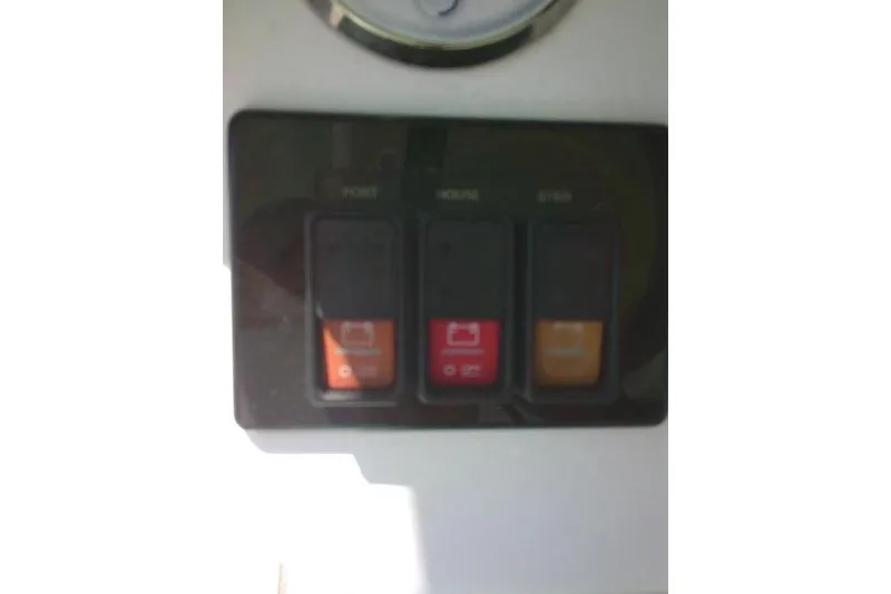 Slide: The Image of Control panel on a 2022 Sea Pro 259 Center Console boat. - 77