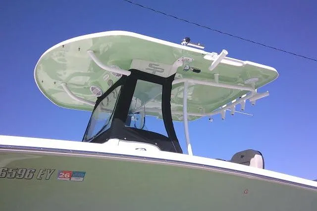 Slide: The Image of 2022 Sea Pro 259 Center Console boat with T-top against clear blue sky. - 8