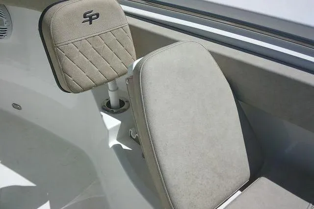 Slide: The Image of 2022 Sea Pro 259 Center Console boat seat with SP logo, beige upholstery. - 81