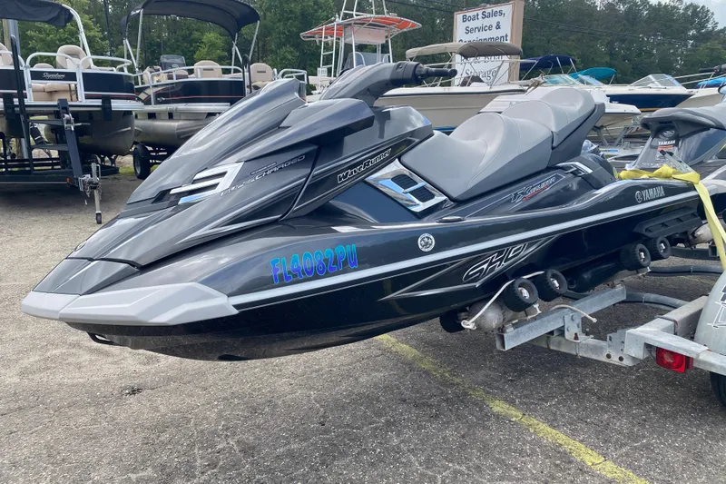 Slide: The Image of 2013 Yamaha WaveRunner FX Cruiser SHO on trailer at boat dealership. - 2