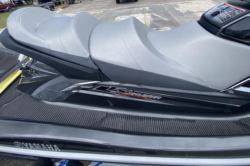 Slide: The Image of 2013 Yamaha WaveRunner FX Cruiser SHO with gray seating and sleek design. - 6