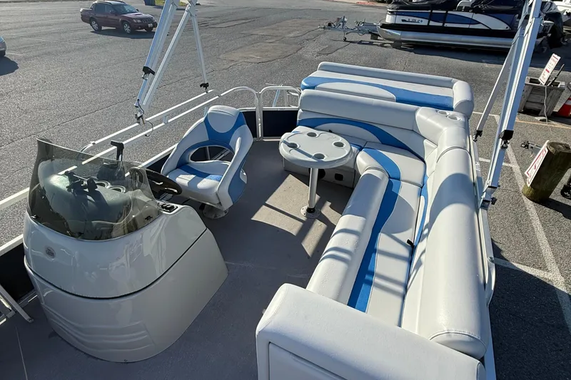 Slide: The Image of 2012 SunCatcher LV 228 Cruise pontoon boat with seating and steering console. - 10