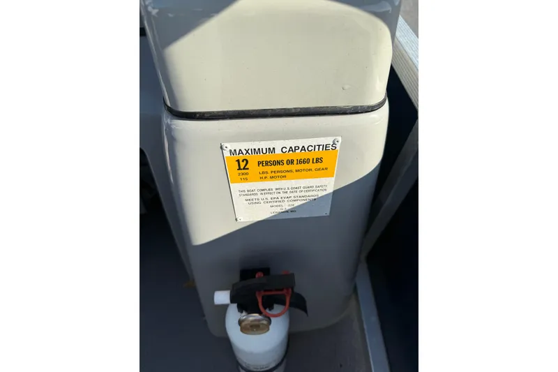 Slide: The Image of 2012 SunCatcher LV 228 Cruise boat capacity label, showing maximum 12 persons or 1660 lbs. - 15