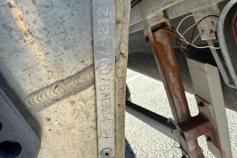 Slide: The Image of Close-up of a 2012 SunCatcher LV 228 Cruise boat's identification plate. - 16