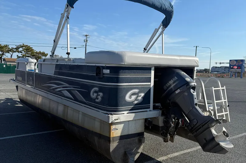 Slide: The Image of 2012 SunCatcher LV 228 Cruise pontoon boat with Yamaha outboard motor in parking lot. - 6