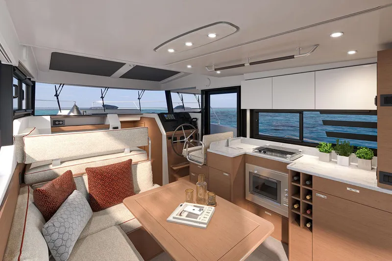 Slide: The Image of Manufacturer Provided Image: Luxurious interior of 2026 Beneteau Swift Trawler 37 Fly with modern kitchen and seating area. - 4