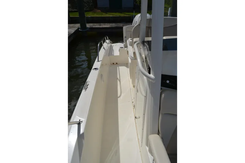 Slide: The Image of 2021 Boston Whaler 270 Dauntless boat interior, showcasing sleek design and spacious layout. - 18