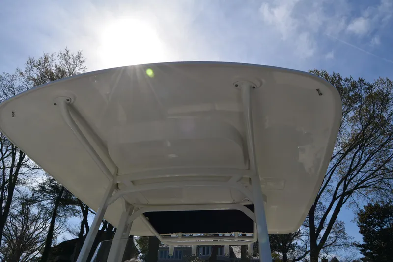 Slide: The Image of Boston Whaler 270 Dauntless 2021 boat canopy under bright sun and blue sky. - 33