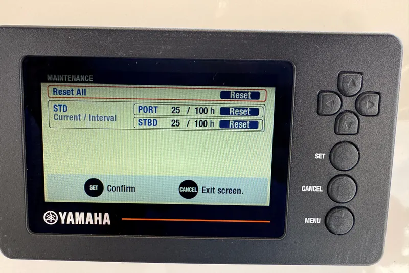 Slide: The Image of Yamaha maintenance screen on 2001 Intrepid 339 Walkaround boat, showing reset options. - 16