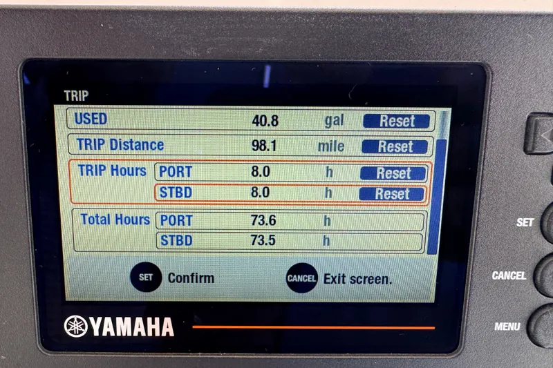Slide: The Image of Yamaha trip display showing fuel usage and trip details for 2001 Intrepid 339 Walkaround. - 17