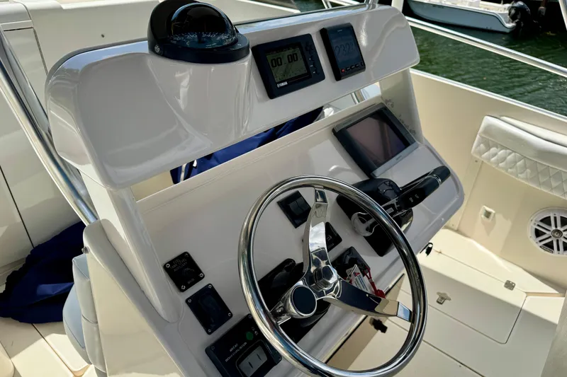 Slide: The Image of Helm of 2001 Intrepid 339 Walkaround with steering wheel and navigation instruments. - 21
