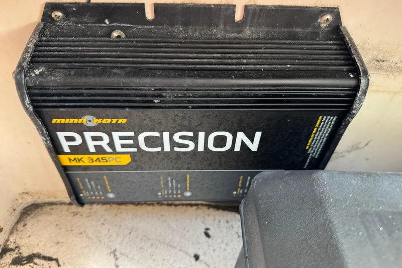 Slide: The Image of Minn Kota Precision MK 345PC charger installed on a 2001 Intrepid 339 Walkaround boat. - 37