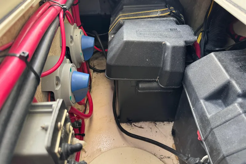 Slide: The Image of Electrical components and wiring inside a 2001 Intrepid 339 Walkaround boat. - 38