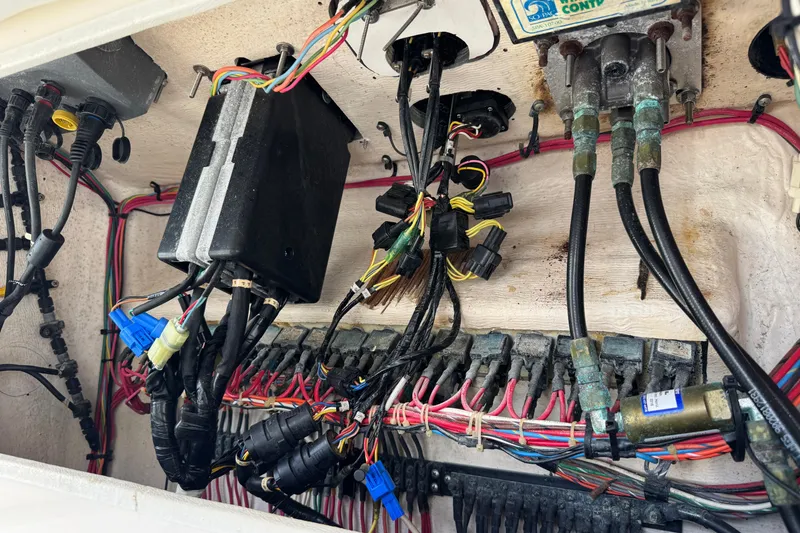 Slide: The Image of Electrical wiring and components inside a 2001 Intrepid 339 Walkaround boat. - 39