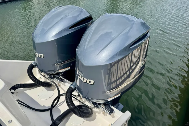 Slide: The Image of Twin Yamaha 300 outboard engines on a 2001 Intrepid 339 Walkaround boat. - 7