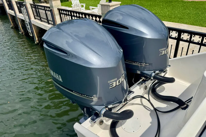Slide: The Image of Twin Yamaha 300 outboard engines on a 2001 Intrepid 339 Walkaround boat. - 8