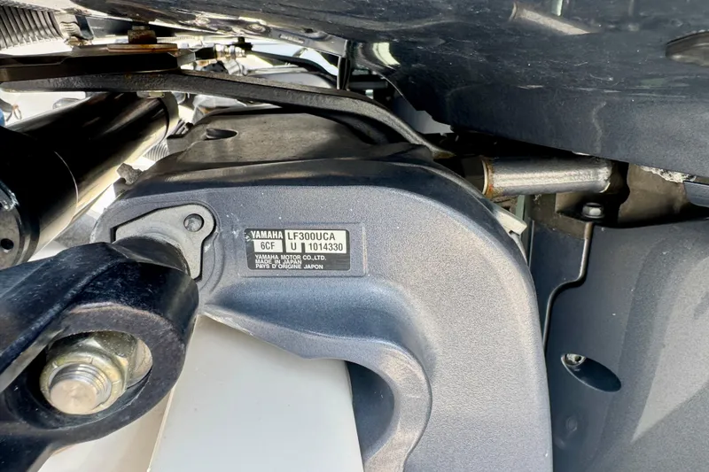 Slide: The Image of Close-up of Yamaha LF300UCA engine part on 2001 Intrepid 339 Walkaround boat. - 9