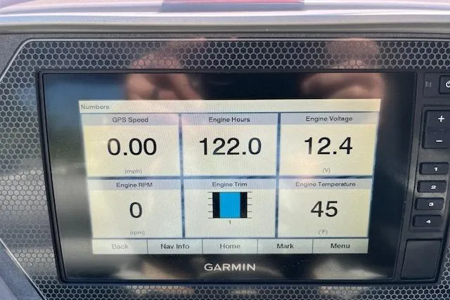Slide: The Image of Garmin display showing engine metrics for 2020 Manitou 25 OASIS SL VP boat. - 13