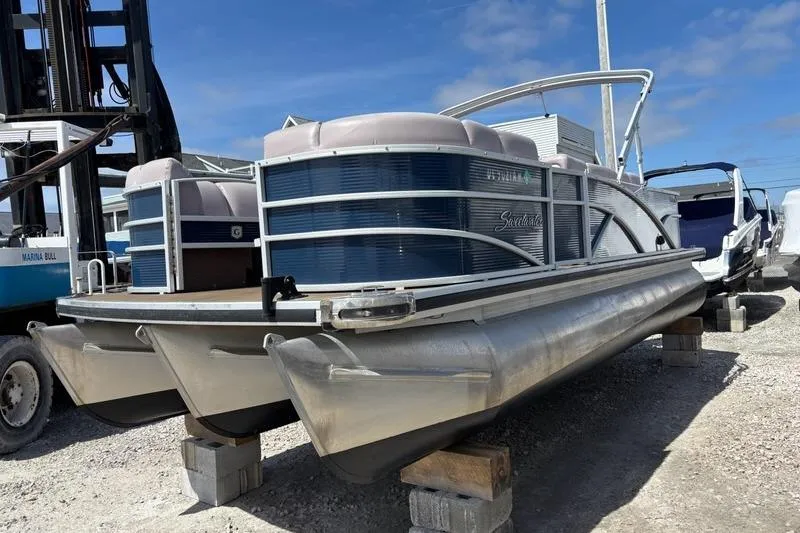Slide: The Image of 2020 Godfrey Sweetwater 2286 FS pontoon boat on dry dock, sunny day. - 1