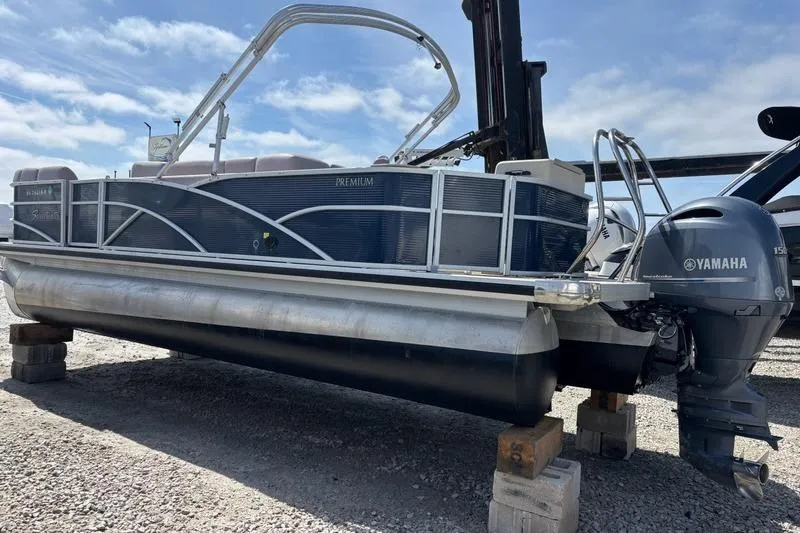 Slide: The Image of 2020 Godfrey Sweetwater 2286 FS pontoon boat with Yamaha outboard motor on dry dock. - 2