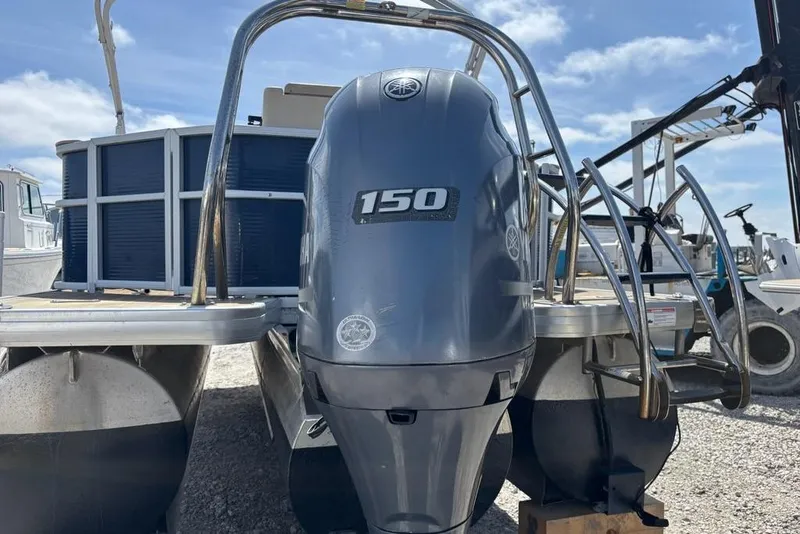 Slide: The Image of 2020 Godfrey Sweetwater 2286 FS pontoon boat with a 150 horsepower outboard motor. - 11