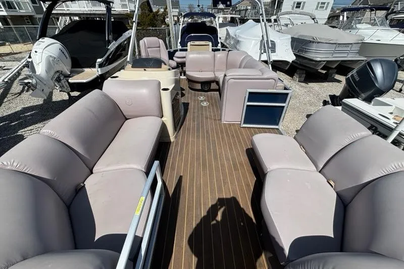 Slide: The Image of 2020 Godfrey Sweetwater 2286 FS pontoon boat with spacious seating and wood-style flooring. - 7