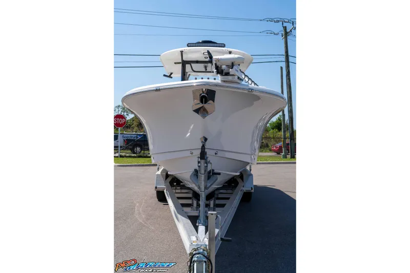 Slide: The Image of 2025 Sea Hunt Gamefish 28 Forward Seating boat on trailer, front view. - 11