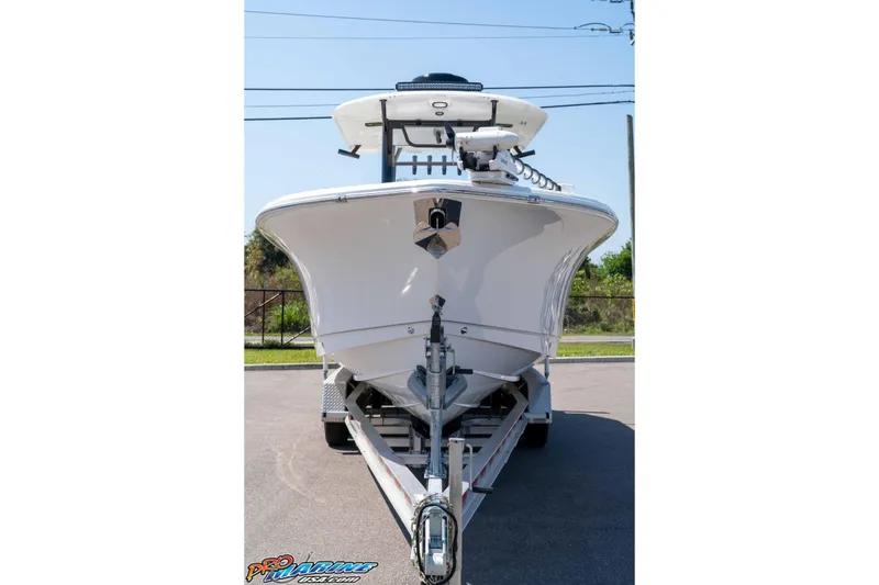 Slide: The Image of 2025 Sea Hunt Gamefish 28 Forward Seating boat on trailer, front view. - 2