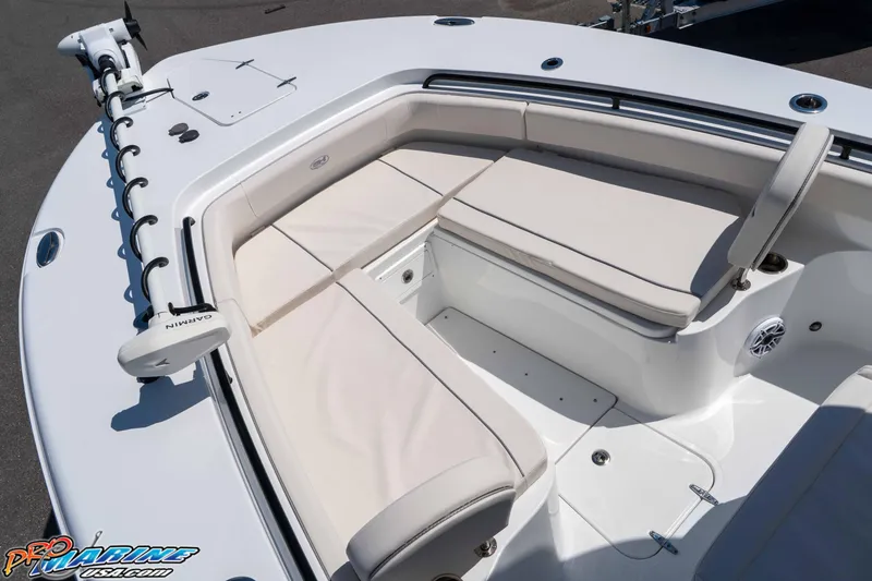 Slide: The Image of 2025 Sea Hunt Gamefish 28 Forward Seating with cushioned bow area and Garmin equipment. - 24
