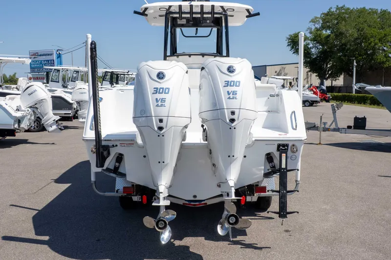 Slide: The Image of 2025 Sea Hunt Gamefish 28 with twin Yamaha 300 V6 engines, rear view. - 36