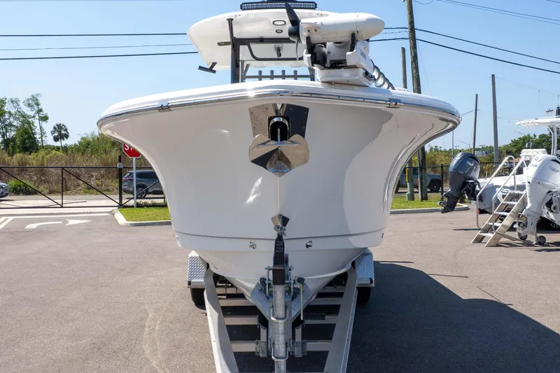Slide: The Image of 2025 Sea Hunt Gamefish 28 Forward Seating boat on trailer, front view. - 44