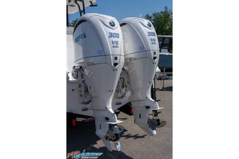 Slide: The Image of Twin Yamaha 300 V6 outboard engines on a 2025 Sea Hunt Gamefish 28 boat. - 7
