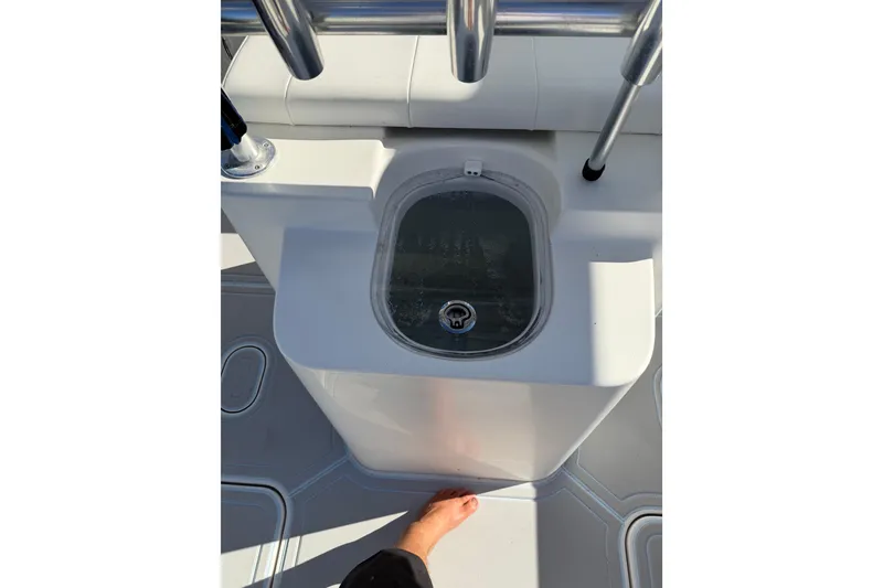 Slide: The Image of 2020 Tideline 235 Hybrid boat deck with livewell and stainless steel railing. - 13