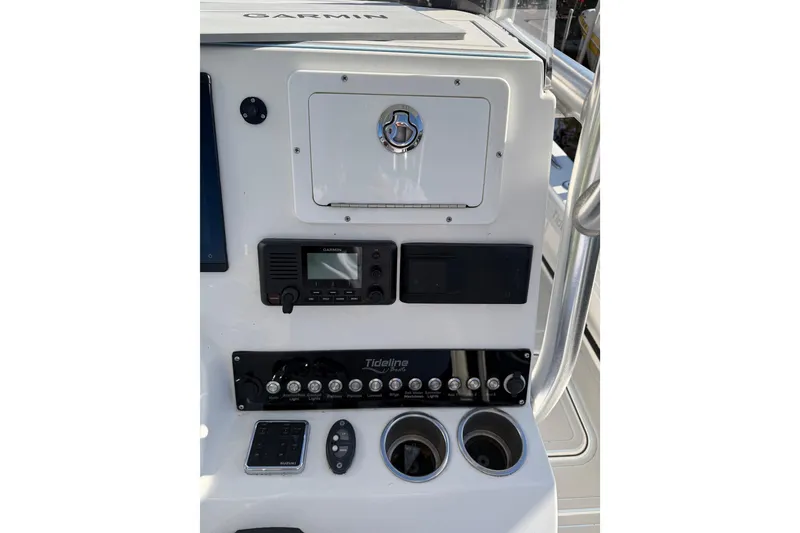 Slide: The Image of Control panel of 2020 Tideline 235 Hybrid boat with Garmin electronics. - 16
