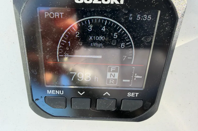 Slide: The Image of Suzuki engine display showing 793 hours on Tideline 235 Hybrid, 2020 model. - 34