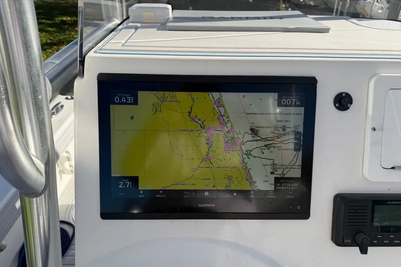 Slide: The Image of Garmin navigation display on 2020 Tideline 235 Hybrid boat dashboard. - 37