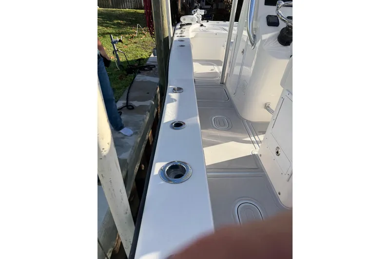 Slide: The Image of 2020 Tideline 235 Hybrid boat deck with rod holders and clean design. - 39