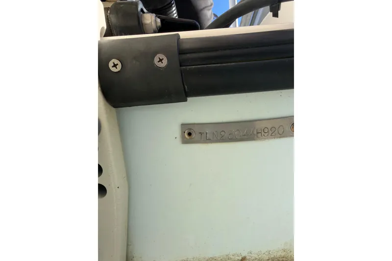 Slide: The Image of Close-up of Tideline 235 Hybrid 2020 boat hull identification number plate. - 43