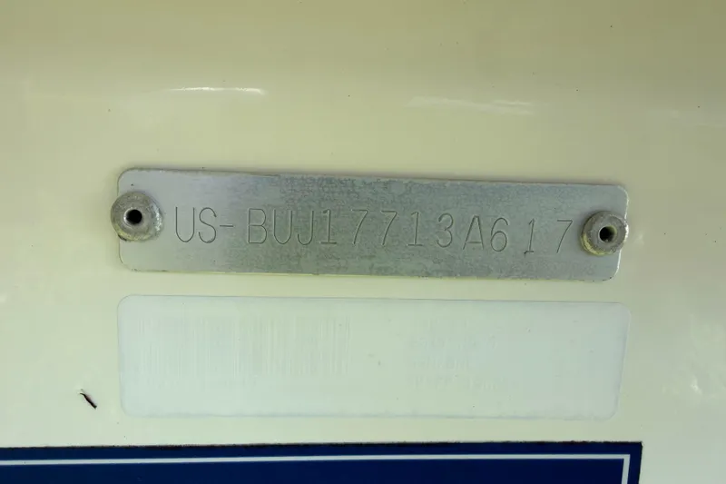 Slide: The Image of Hull identification number on a 2020 Tideline 235 Hybrid boat. - 62