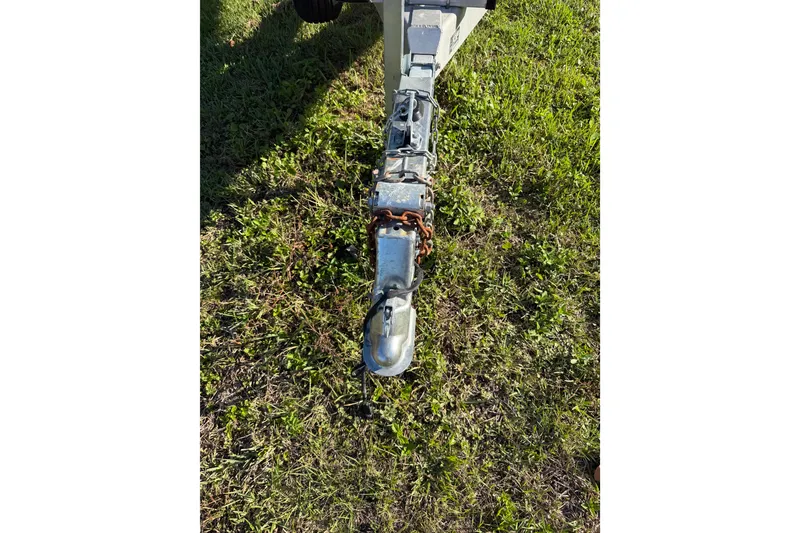 Slide: The Image of Trailer hitch of a 2020 Tideline 235 Hybrid on grassy ground. - 68