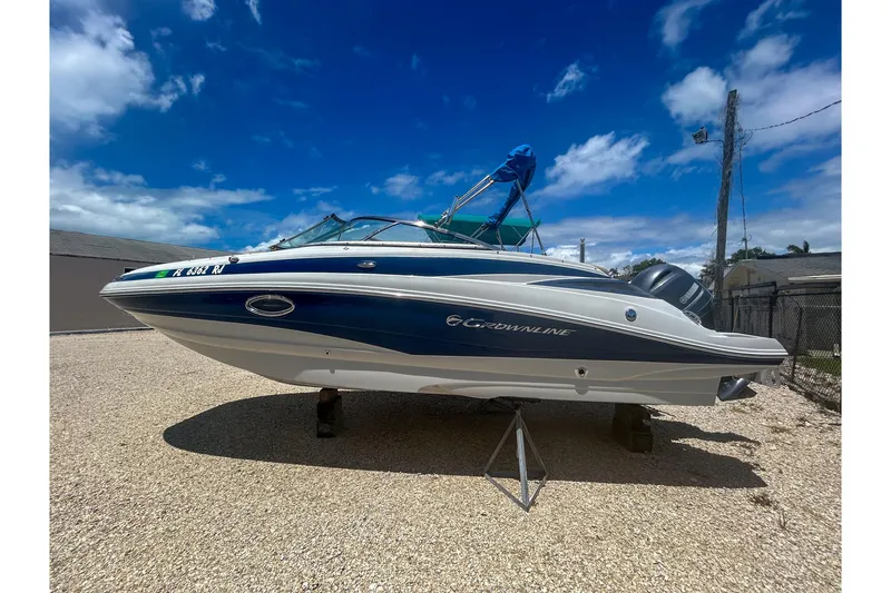 The Image of 2017 Crownline Eclipse E2 XS boat displayed outdoors under a clear blue sky. - 0