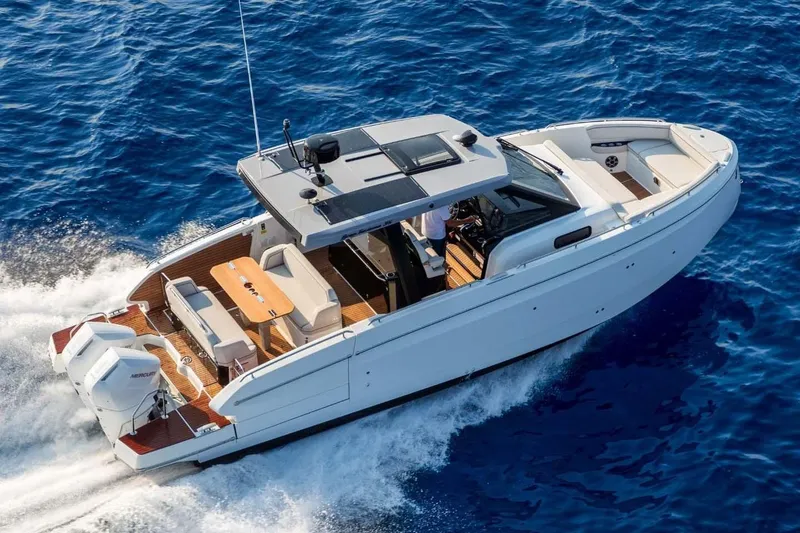 Slide: The Image of Manufacturer Provided Image: 2025 Beneteau Gran Turismo 35 cruising on open blue waters. - 1