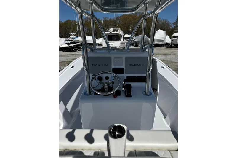 Slide: The Image of Center console of a 2025 Weaver 25 boat with Garmin navigation system. - 4