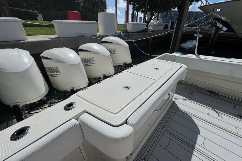 Slide: The Image of 2012 Hydra-Sports 4200 SF boat with Yamaha outboard engines docked at marina. - 3
