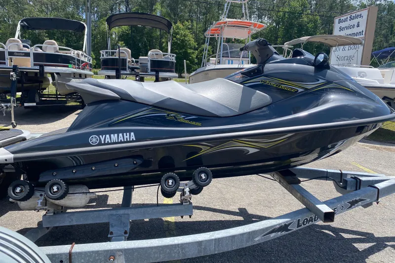 Slide: The Image of 2014 Yamaha WaveRunner VX Deluxe on trailer at boat dealership. - 1