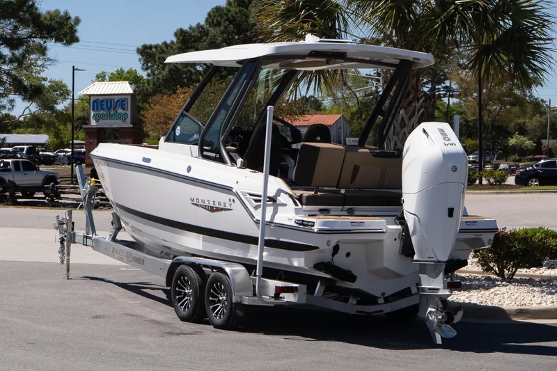 Slide: The Image of 2026 Monterey Elite 25 OB boat on trailer at Neuse Sport Shop. - 4