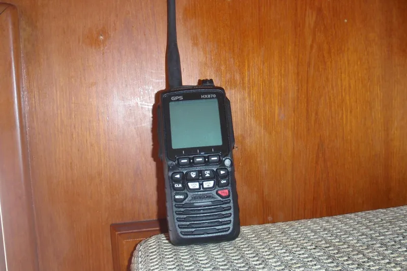 Slide: The Image of Handheld GPS radio on wooden panel, Ocean Alexander 1985 yacht interior. - 47